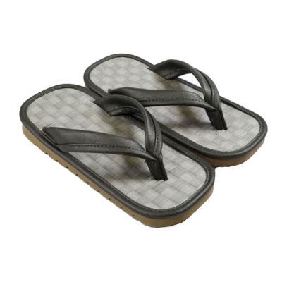 Close-up of the textured gray footbed on traditional Japanese Setta sandals.