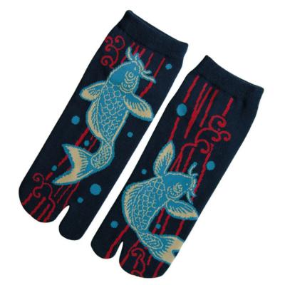 Japanese split-toe tabi socks featuring colorful carp and waterfall