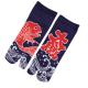 Japanese tabi socks featuring a colorful fish jumping from ocean waves