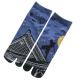 Japanese split-toe tabi socks featuring a ninja in action at night
