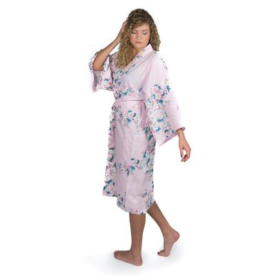 Women's pink Happi Coat with delicate cherry blossoms, matching belt, and side pocket